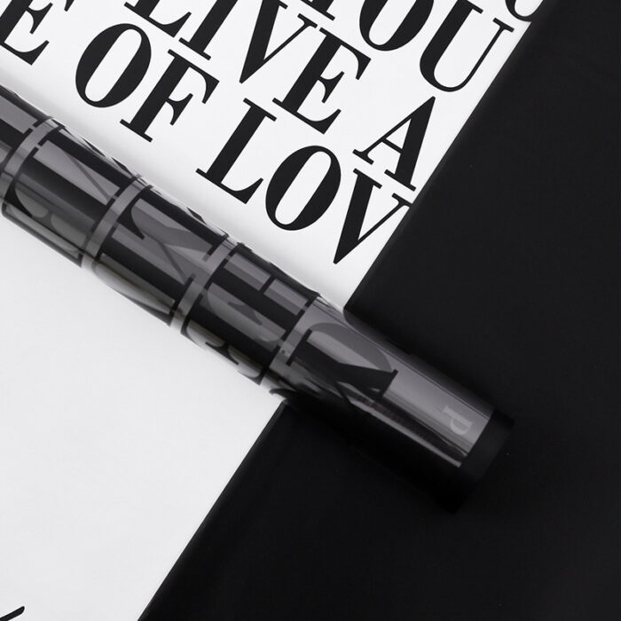 Big Letter Floral Wrapping Paper black