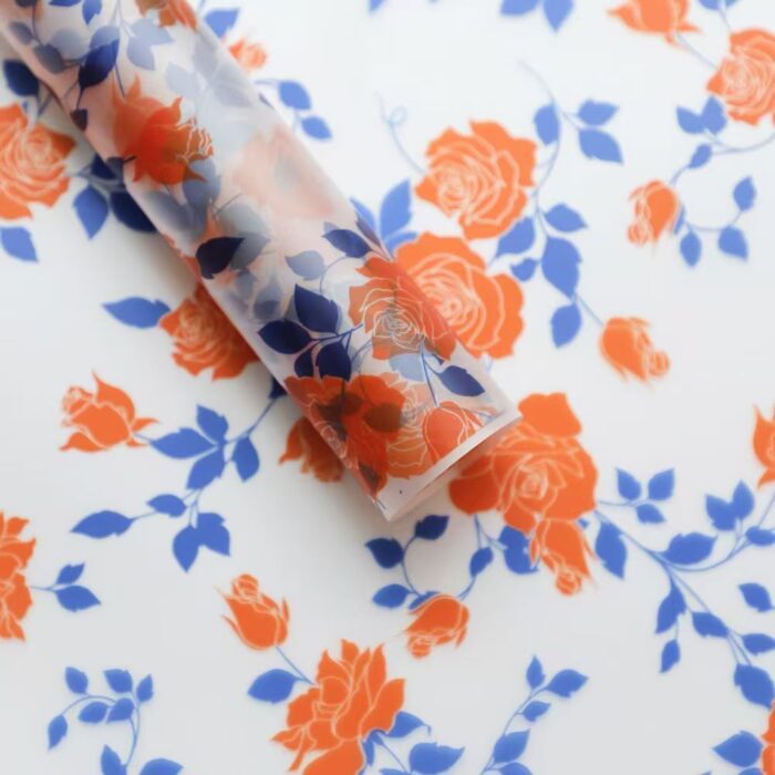 Loews Roes Wrapping Paper orange and blue leaf