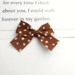 Leopard Print Bow deep coffee Size: 5.5X7.5CM